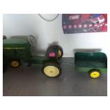 John Deere 520 pedal tractor with cart. 4455