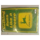 John Deere sign. Still in cellophane