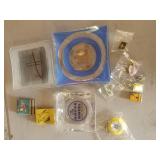 Ashtrays, matchbooks, keychain and pins