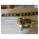 John Deere sign and John Deere chainsaw