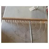Wood rake. 71" long, 28" wide