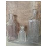 (3) bottles. (2) Drs. W and S Marshall. (1)