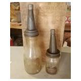 2 oil jars. 1- one quart, 1- Ball mason jar