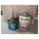 (2) small oil cans