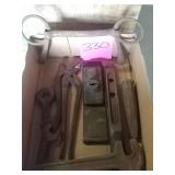 Wrenches and old horse bit