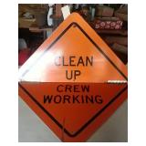 Clean up crew worker signs