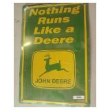 John Deere sign. Still in cellophane