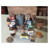 Antique bottles and tin