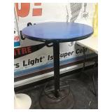 Blue round table. 29" diameter. 42" tall