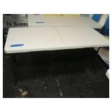 Rectangle folding table. 60" by 27 in by 29 in