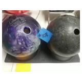 2 bowling balls w/ rack. 1 purple, silver, Green