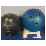 2 bowling balls with stand