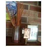 Brass or copper mantel decor