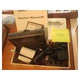 Cigar box with weather wizard