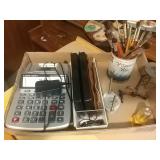 Adding machine, calculators, paintbrush, mini