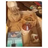 Coconut monkey, canteen, old maple jar and oil