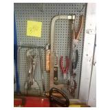 Pliers wire cutters level and hacksaw