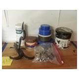 Metal tins with hardware inside