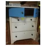 Blue and white cabinet with contents