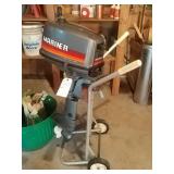 Mariner out board motor with stand