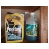 Jugs  windshield fluid and antifreeze not full