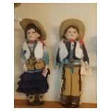 Cowboy and Cowgirl porcelain dolls. 24"