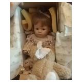 Crying baby with bear porcelain doll