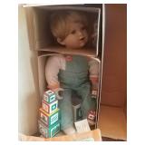 Little boy porcelain doll