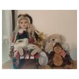 Christmas porcelain doll, a bear in the monkey