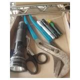Flashlight, pliers and scissors