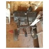 Pull along spreader