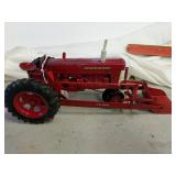 1/16 Farmall row crop tractor with loader