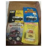 (4) 1:64 trucks and tractors