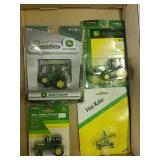 John Deere 1:64 scale tractors with hay rake