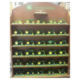 John Deere shelf with 1:64 tractors. Dan Berry