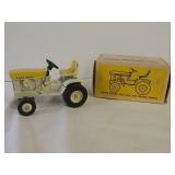 Original lawn and garden, tractor. April yellow