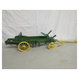 Vintage wooden John Deere manure spreader with