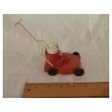 Moving lawn mower salt and pepper shaker. ( salt