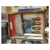 Rivet gun, screwdriver and levels