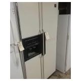 Whirlpool refrigerator.  69 inches tall.35 1/2