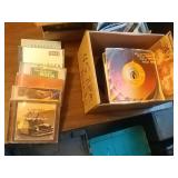 6 CDs and box of records. List of records on in