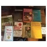 8 books and a pack of post cards