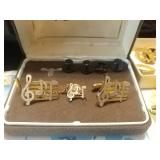 Musical note cuff links and tie pin