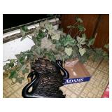 2 swan wall hangings and fake ivy