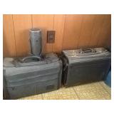 (2) brief cases and a Tamron canister