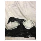 Milk glass covered dishes Hand holding a bird 8x5