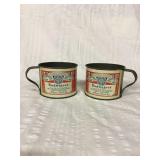 Two Budweiser tin mugs