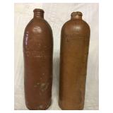 Old beer bottles One is chipped on top. 12 inches