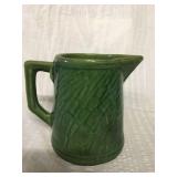 Old green crockery pitcher 6 inches high 5 inches