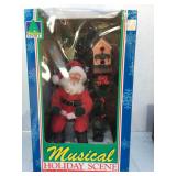 Holiday scene musical and animated skating pond